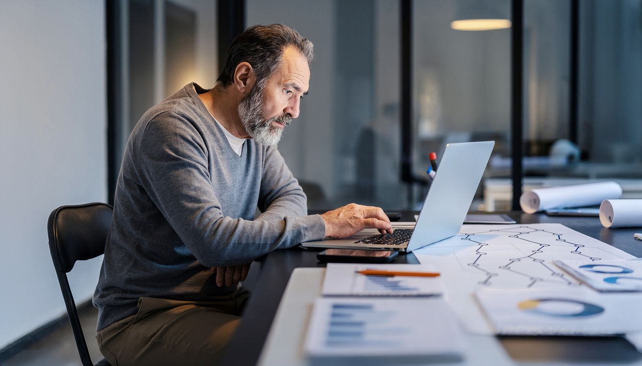 Man working late at an office desk